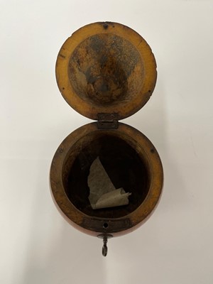 Lot 655 - A George III fruitwood pear-shaped tea caddy