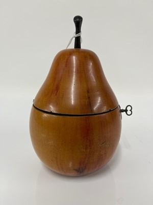 Lot 655 - A George III fruitwood pear-shaped tea caddy