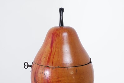 Lot 655 - A George III fruitwood pear-shaped tea caddy