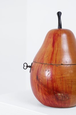 Lot 655 - A George III fruitwood pear-shaped tea caddy