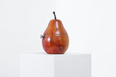 Lot 655 - A George III fruitwood pear-shaped tea caddy