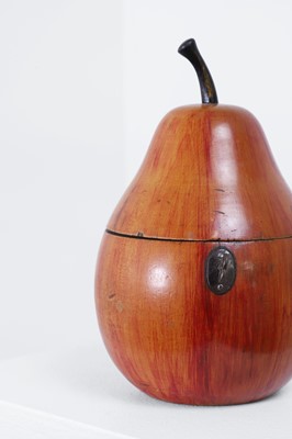 Lot 655 - A George III fruitwood pear-shaped tea caddy