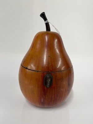 Lot 655 - A George III fruitwood pear-shaped tea caddy