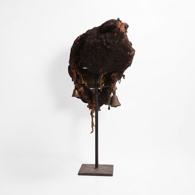 Lot 102 - A carved hardwood mask