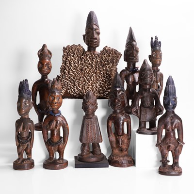 Lot 175 - A collection of ten African carved wood figures