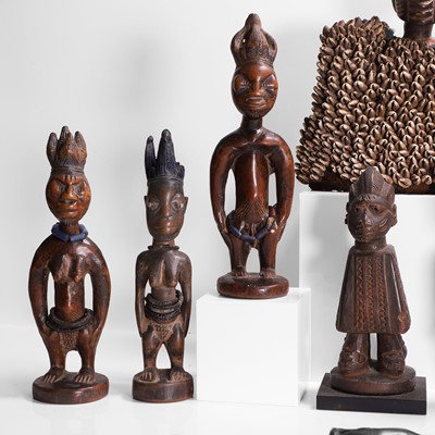 Lot 175 - A collection of ten African carved wood figures