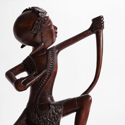 Lot 387 - A group of carved wood figures