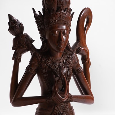 Lot 387 - A group of carved wood figures