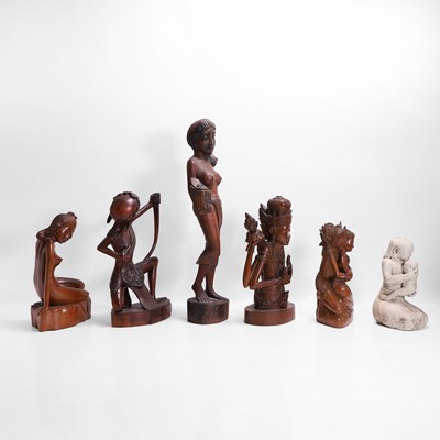 Lot 387 - A group of carved wood figures