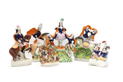 Lot 151 - A collection of six Staffordshire figures