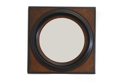 Lot 567 - A walnut and rosewood convex mirror