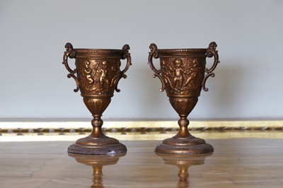 Lot 11 - A pair of bronzed-metal urns