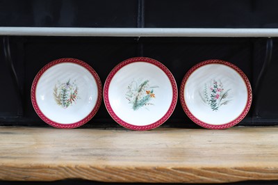 Lot 365 - A Royal Worcester porcelain cake stand and two plates