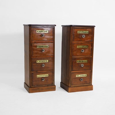 Lot 454 - A pair of mahogany and pine apothecary cabinets