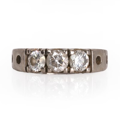 Lot 1119 - An 18ct white gold diamond three stone ring