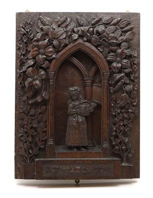 Lot 161 - A carved oak carved panel