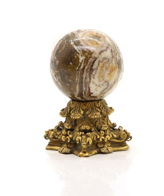 Lot 138 - A hardstone sphere