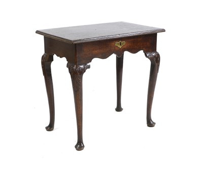 Lot 188 - An oak side table with lift up top