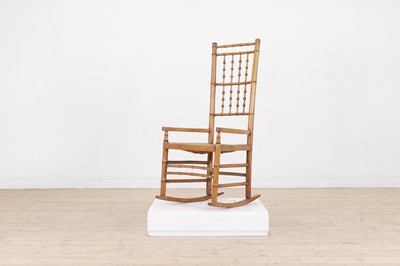 Lot 85 - An ash faux bamboo rocking chair