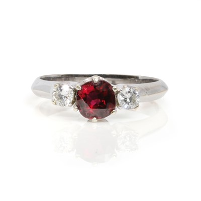 Lot 189 - A white gold ruby and diamond three stone ring