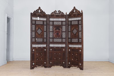 Lot 496 - A carved and inlaid wooden screen