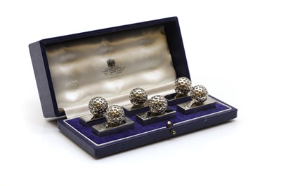 Lot 345 - A set of six Asprey silver-plated novelty place-card holders