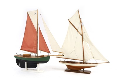 Lot 228 - A near pair of wooden pond yachts