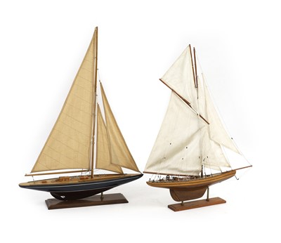 Lot 227 - A near pair of small wooden pond yachts