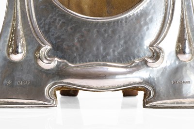 Lot 164 - An Art Nouveau enamelled silver photograph frame