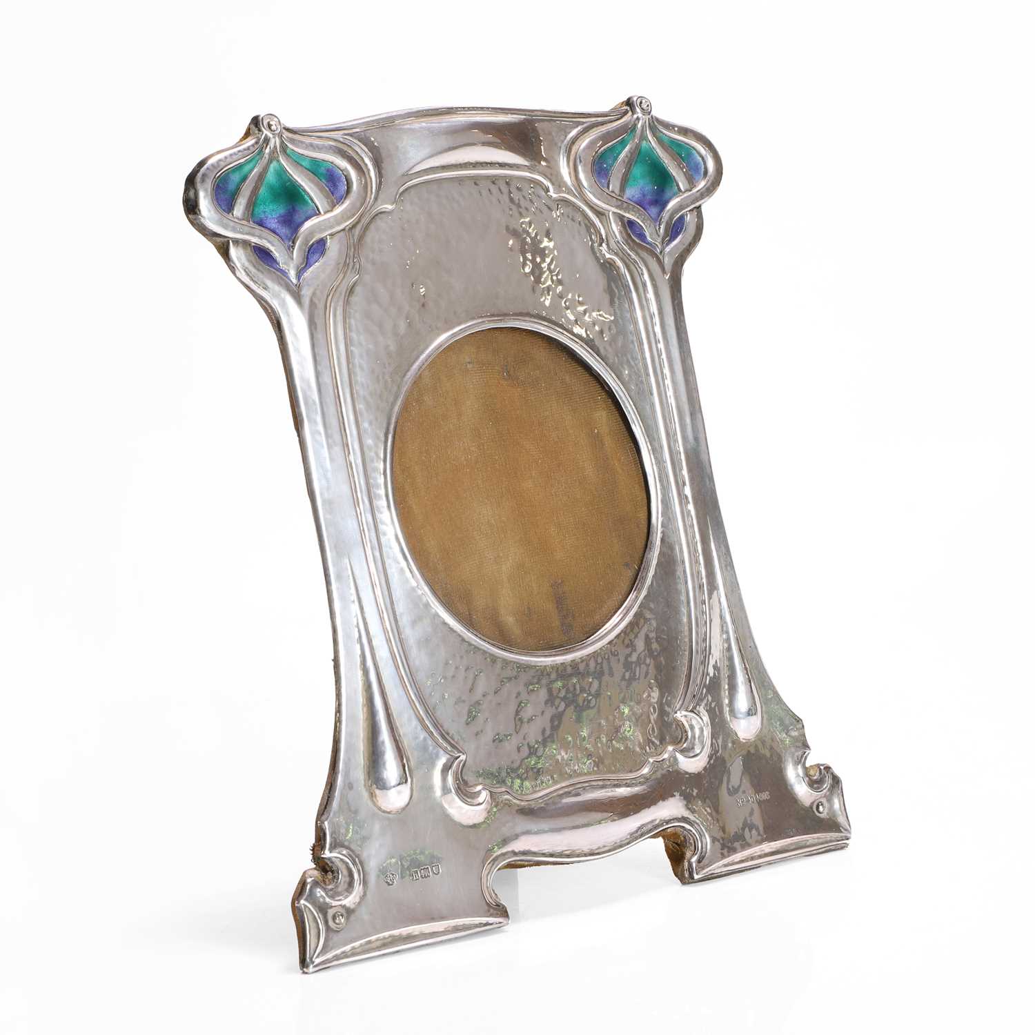 Lot 164 - An Art Nouveau enamelled silver photograph frame