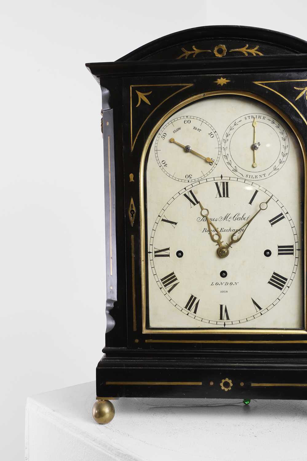 Lot 194 - A Regency ebonised and gilt brass-inlaid table or bracket clock