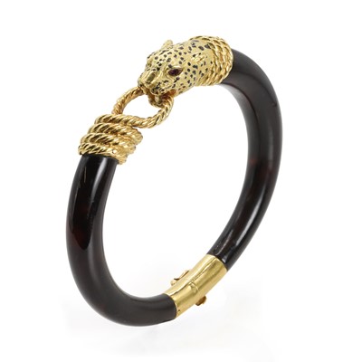 Lot 111 - An 18ct gold and tortoise shell bangle, by Gay Frères, c.1970