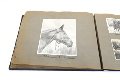 Lot 391 - A photograph album of equestrian interest