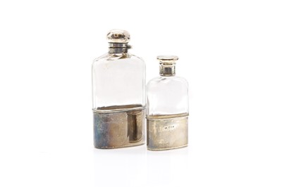 Lot 11 - Two silver mounted hip flasks