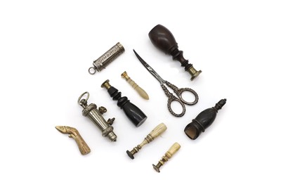 Lot 378 - A collection of tampers and seals