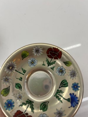 Lot 37 - Two sets of silver and enamelled teacups and saucers