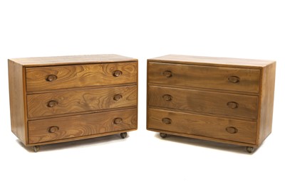 Lot 361 - A pair of Ercol elm bedside chests