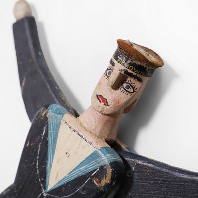 Lot 223 - A folk art jumping jack sailor toy