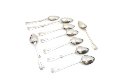 Lot 77 - A group of George III and IV silver serving spoons