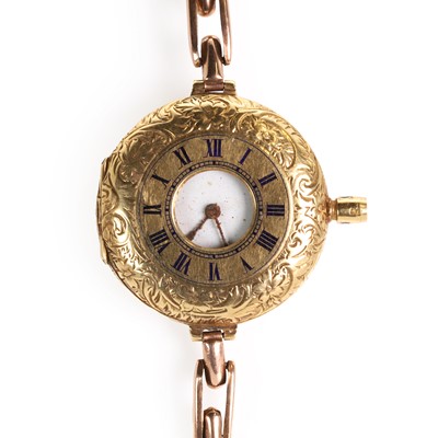 Lot 324 - An 18ct gold half hunter fob/wrist watch