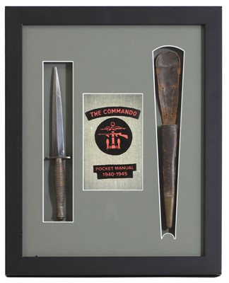 Lot 221 - A Fairbairn-Sykes Second World War commando dagger and leather sheath