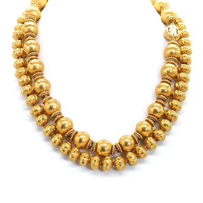 Lot 1253 - Two gold necklaces