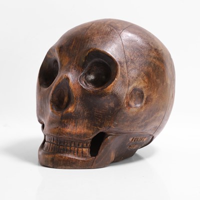 Lot 273 - A carved wood model of a human skull