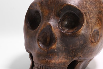 Lot 273 - A carved wood model of a human skull