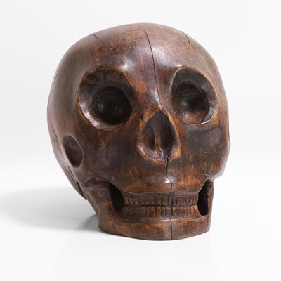 Lot 273 - A carved wood model of a human skull