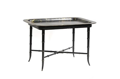 Lot 482 - A black lacquer tray table