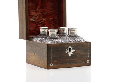 Lot 219 - A rosewood cased set of four scent bottles