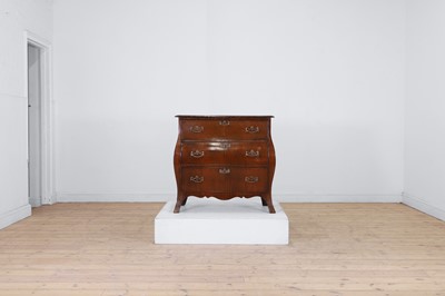 Lot 477 - A mahogany bombé commode