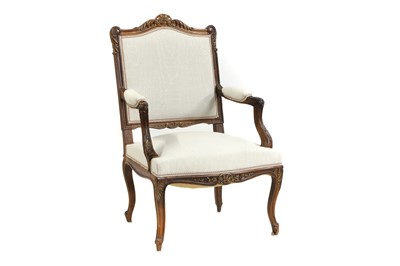 Lot 358 - A French Regence style walnut armchair