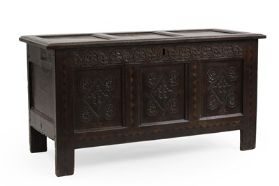 Lot 353 - An oak panelled coffer